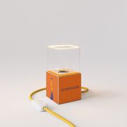 Cubetto table lamp with US plug, "Può nascere un fiore" Ghost bulb - Santomanifesto
